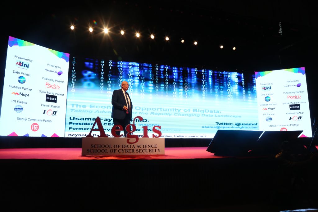 Main stage spotlight with data visuals