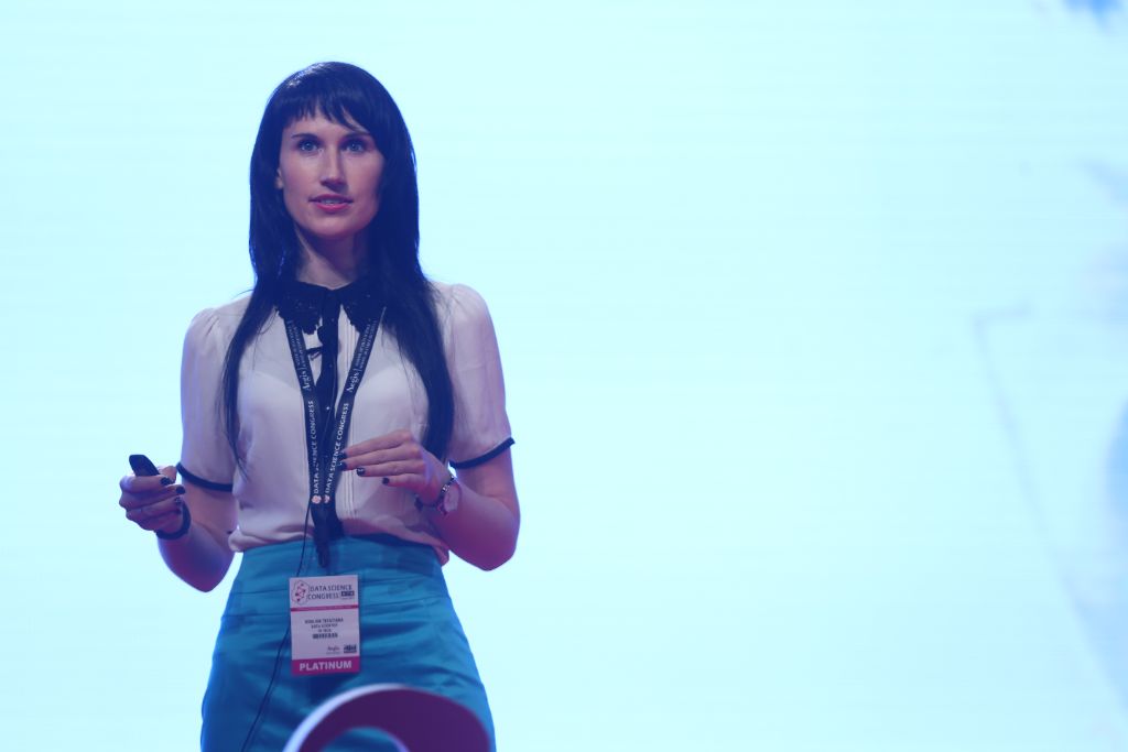 AI researcher delivering a keynote session